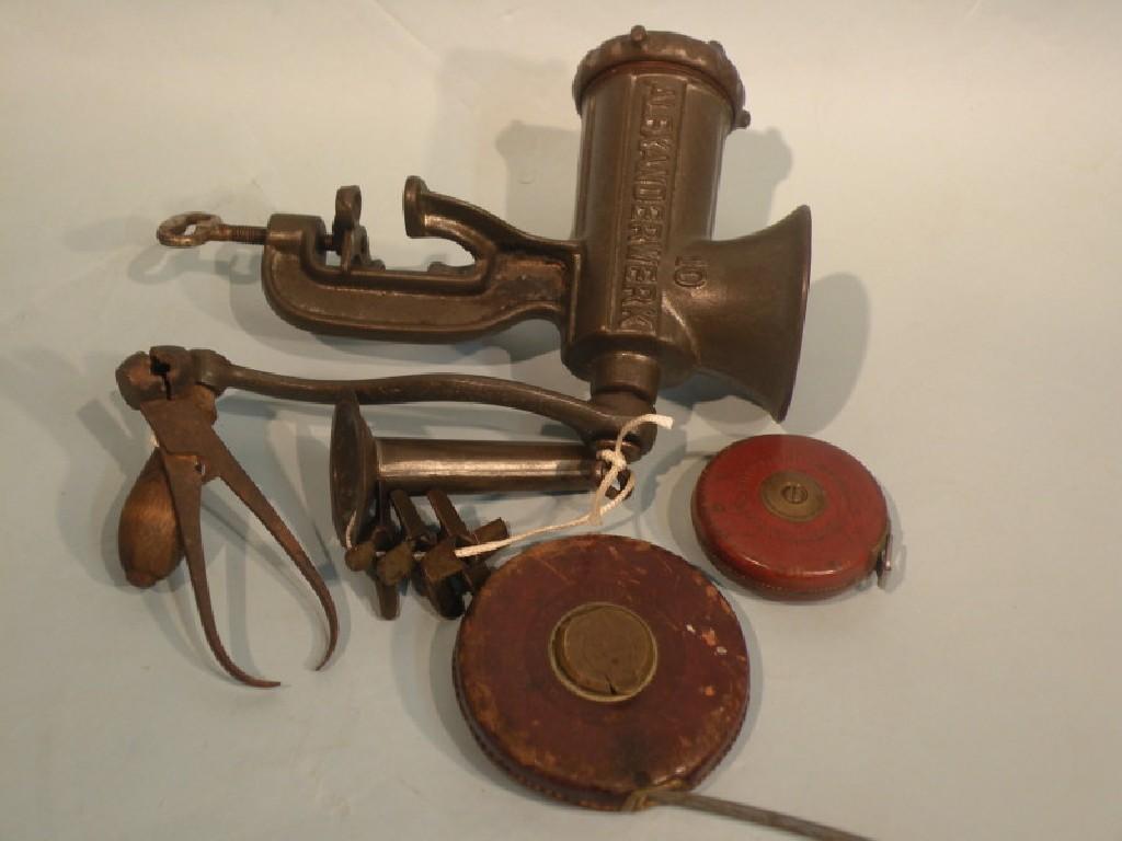 Appraisal: A vintage sausage making machine a bullet mould and two