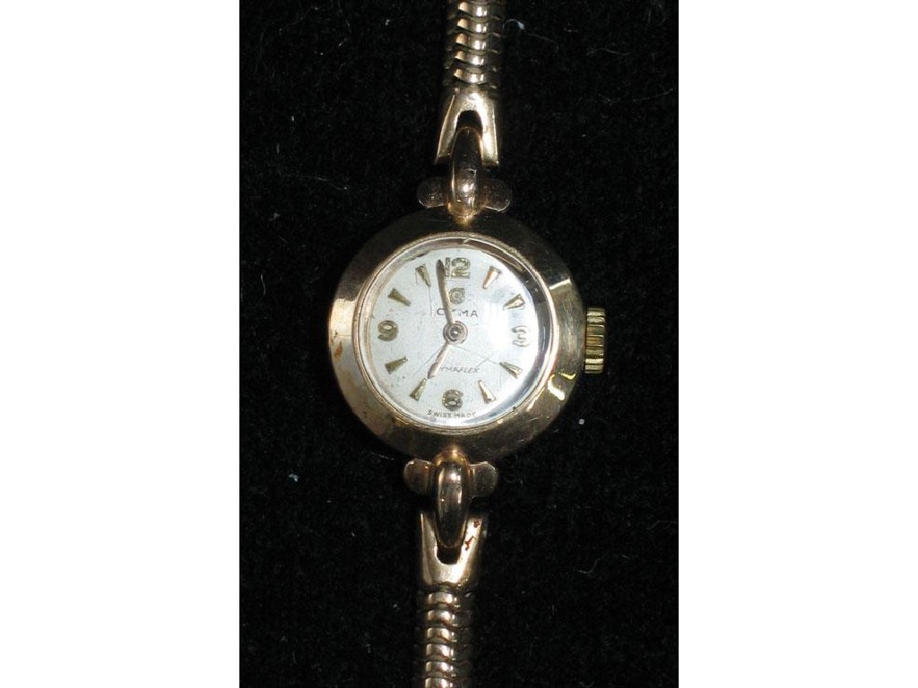 Appraisal: A LADIES CYMA CT GOLD COCKTAIL WATCH the white enamel