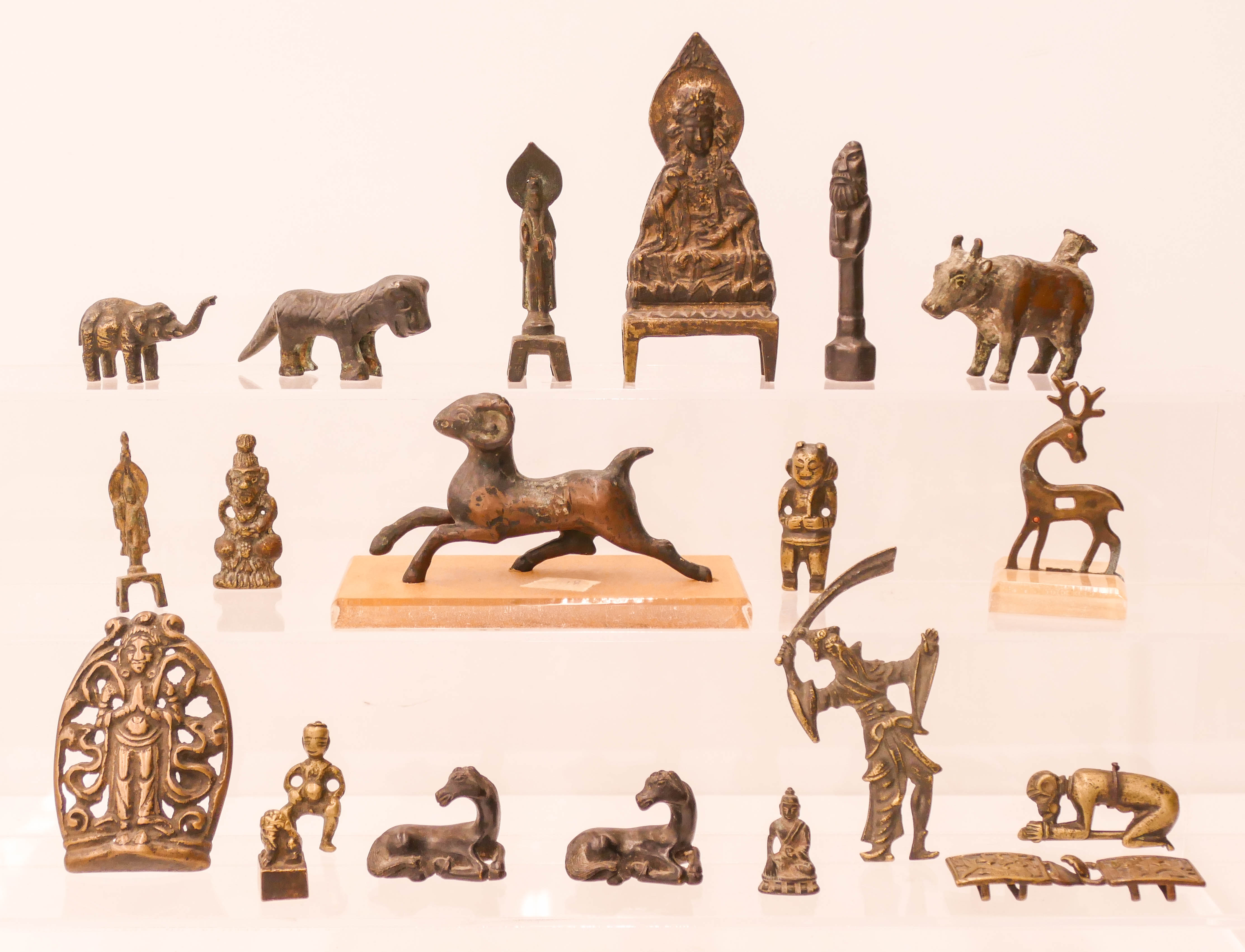 Appraisal: pc Chinese and Southeast Asian Bronze Figures '' to ''