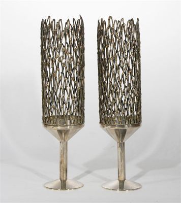 Appraisal: A pair of Stuart Devlin silver and silver-gilt candlesticks cylindrical