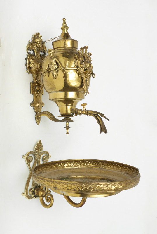 Appraisal: CONTINENTAL FIGURAL BRASS LAVABO Top reservoir with applied figural putti