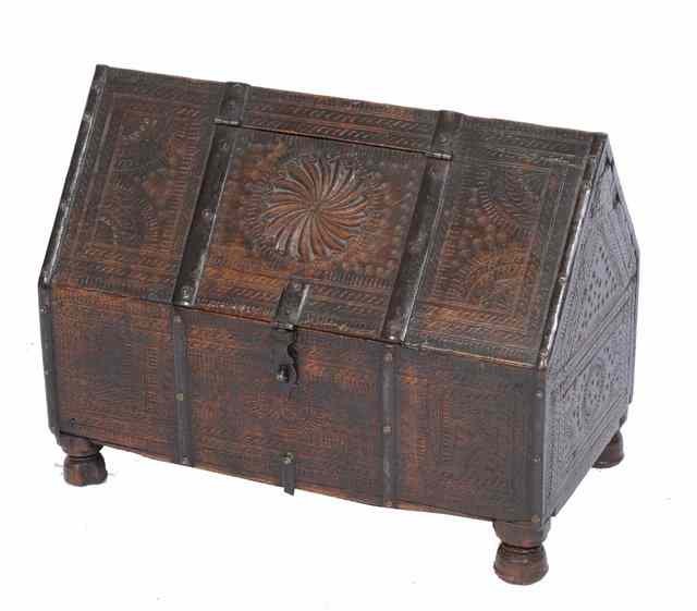 Appraisal: AN ORIENTAL CHIP CARVED IRON BOUND CASKET the pitched top