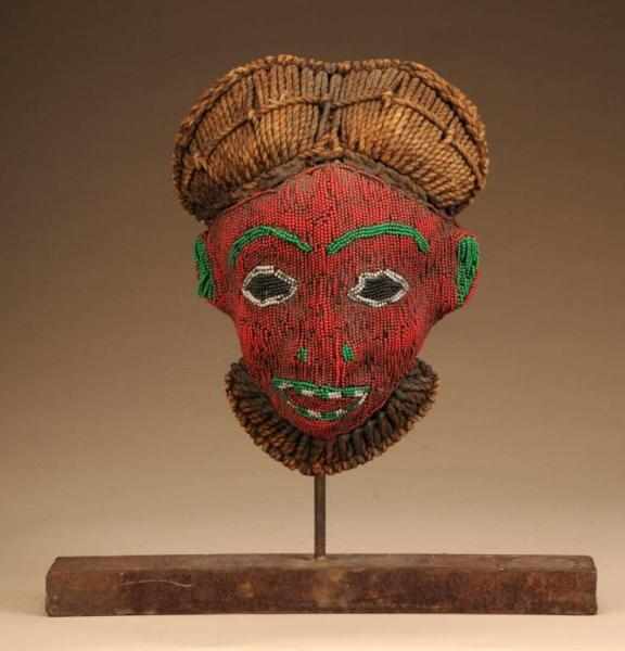 Appraisal: Central African Beaded Mask Description From Cameroon Made of wood