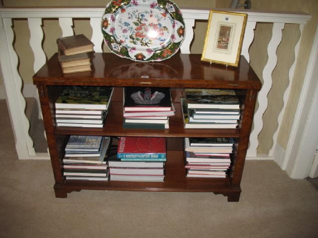 Appraisal: A WALNUT LIBRARY BOOKCASE with a folding rectangular top supported