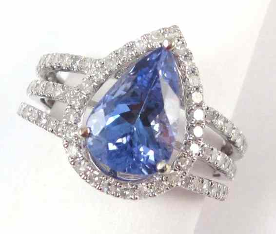 Appraisal: TANZANITE AND DIAMOND RING k white gold with round-cut diamonds