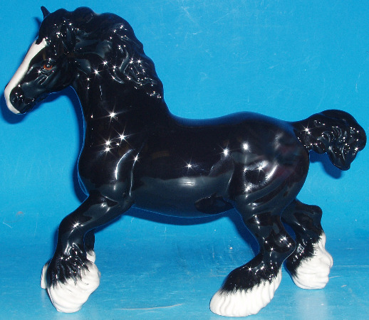 Appraisal: Black Cantering Shire Horse Made For collectors Club