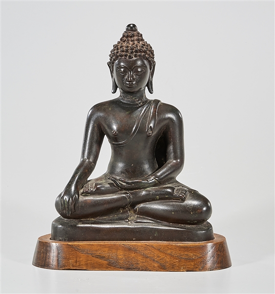 Appraisal: Chinese bronze seated Buddha x x approx Condition wear