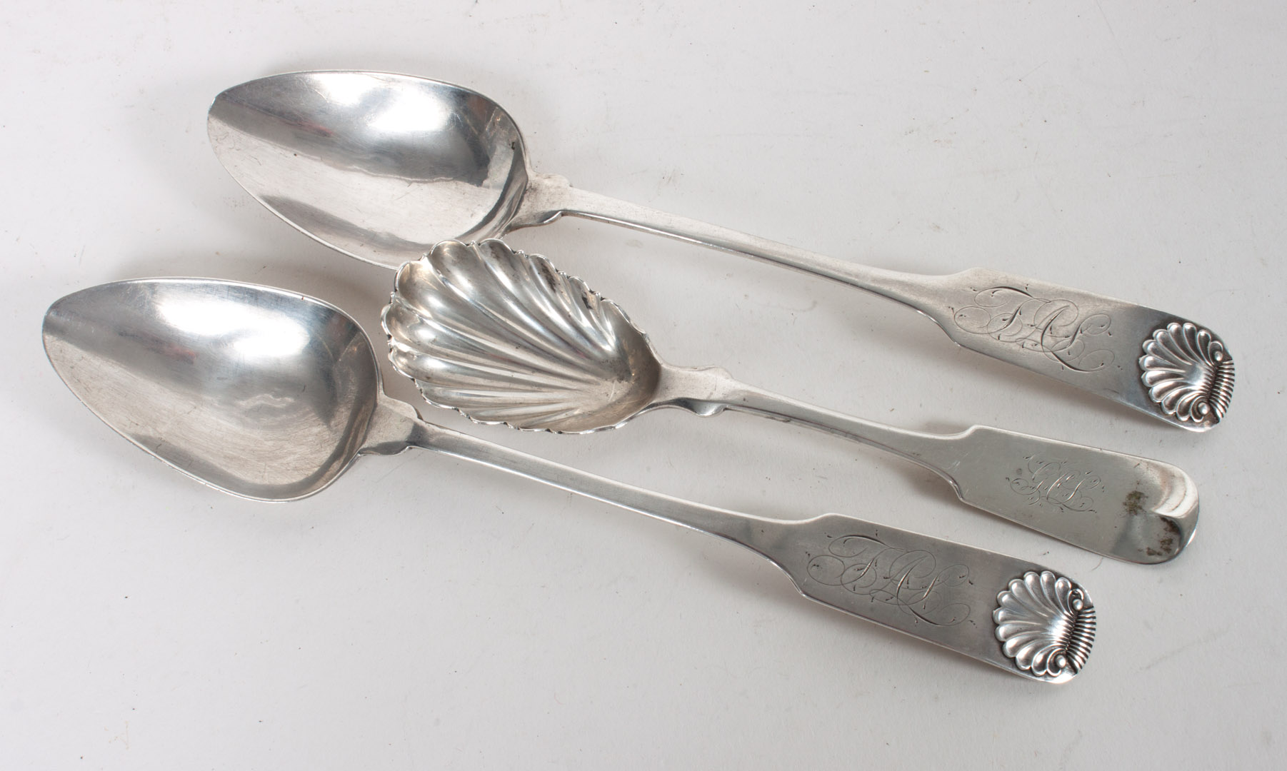 Appraisal: Three American coin silver spoons fiddle shell sugar spoon John