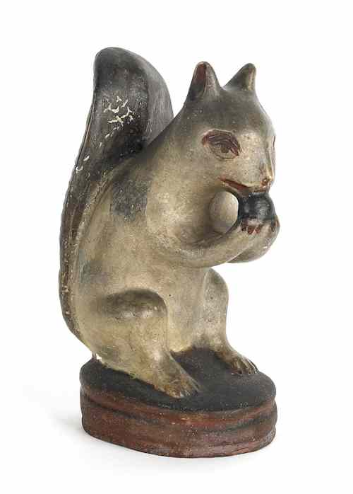 Appraisal: Pennsylvania chalkware figure of a squirrel th c h