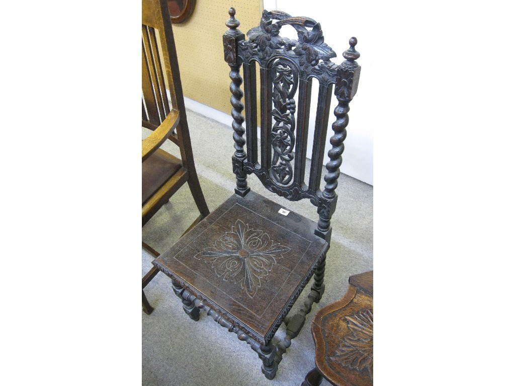 Appraisal: Carved oak hall chair