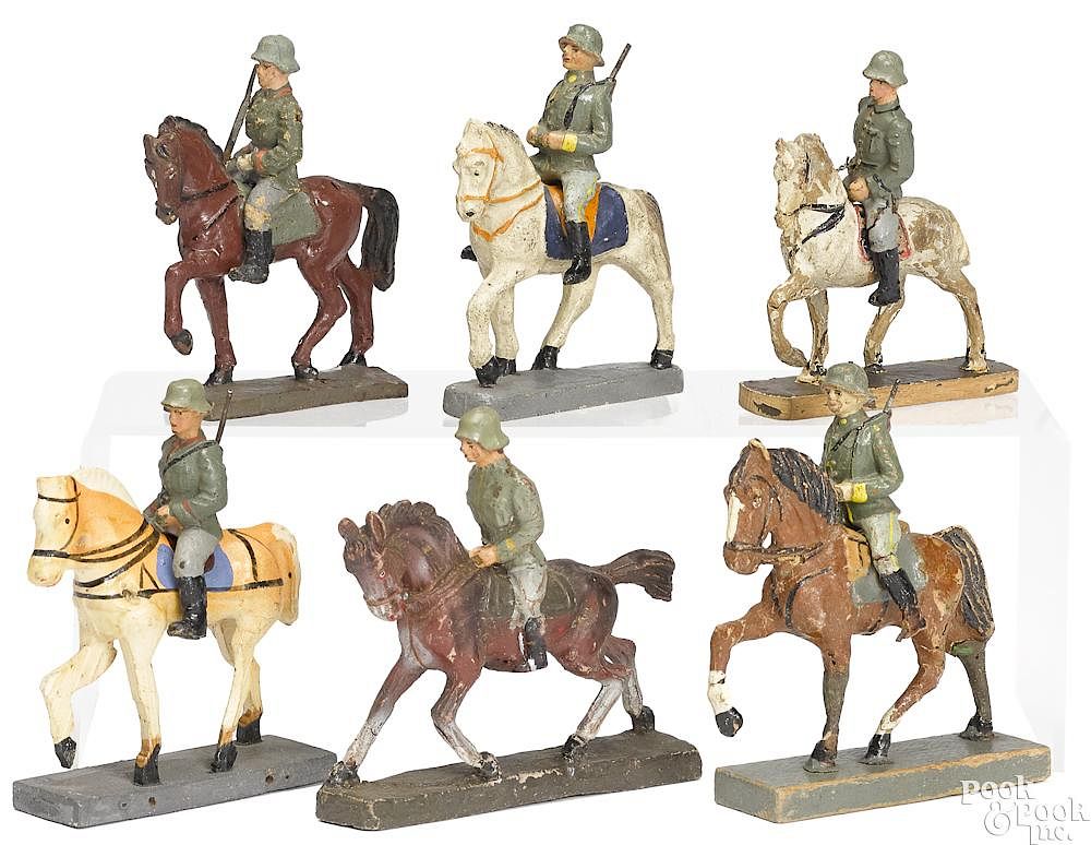 Appraisal: Six German painted composition soldiers Six German painted composition soldiers