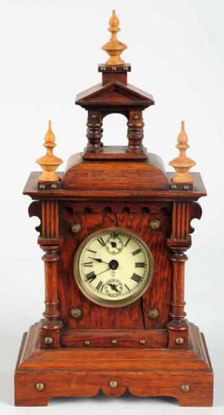 Appraisal: German Clock with -Tune Swiss Music Box Movement Enameled dial