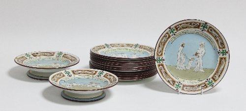 Appraisal: A French Pierrefonds dessert service transfer printed with a medieval