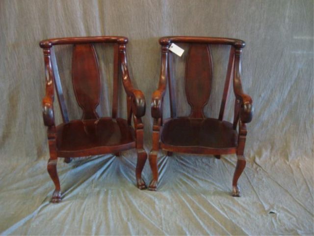 Appraisal: Pair of Scroll Arm and Carved Arm Chairs Estimate -