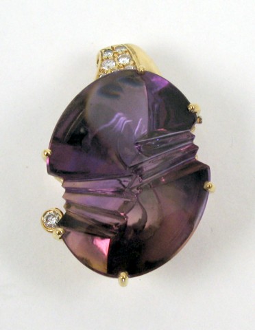 Appraisal: AMETHYST DIAMOND AND YELLOW GOLD PENDANT k gold set with