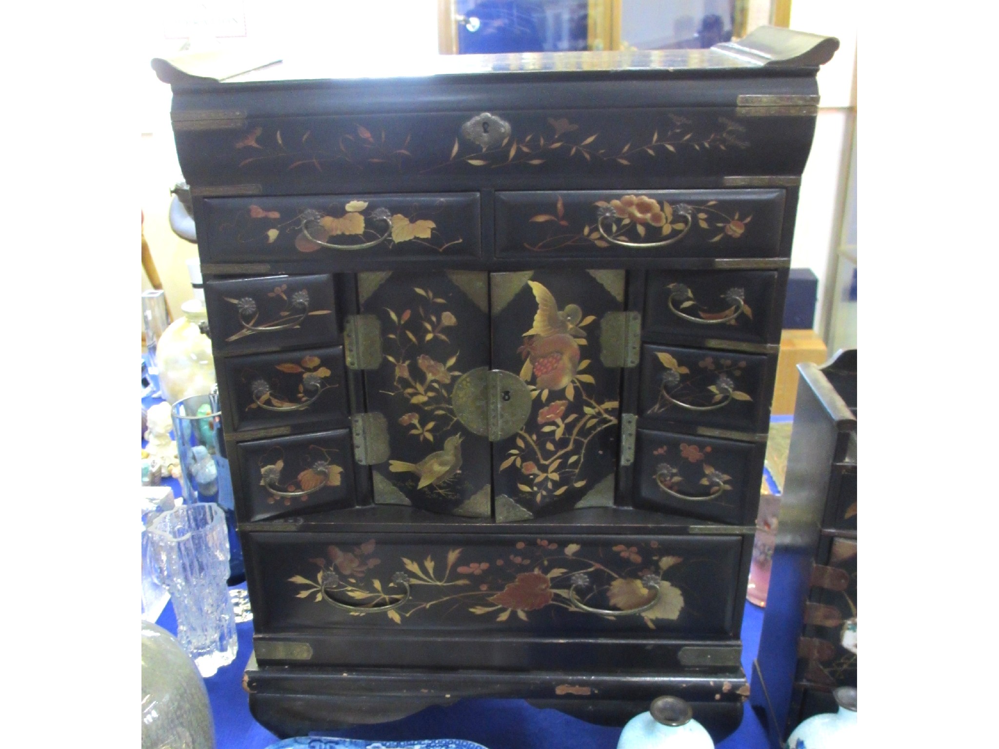 Appraisal: Two Japanese lacquer table cabinets one with birds eating a