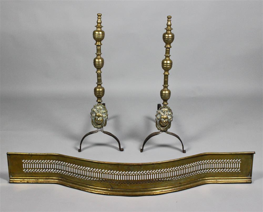 Appraisal: PAIR OF BRASS APPLIED MASK ANDIRONS AND A BRASS SERPENTINE