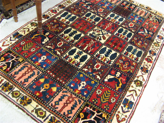 Appraisal: PERSIAN BAKHTIARI GARDEN CARPET Bakhtiari Province southwestern Iran colorful overall