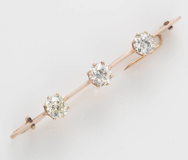 Appraisal: A diamond three-stone bar brooch set with European-cut diamonds estimated