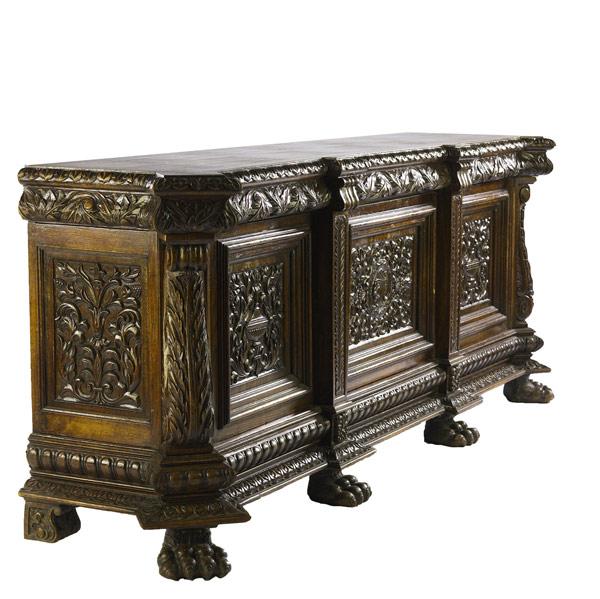 Appraisal: Oak sideboard ca Heavily carved with foliage and three urn