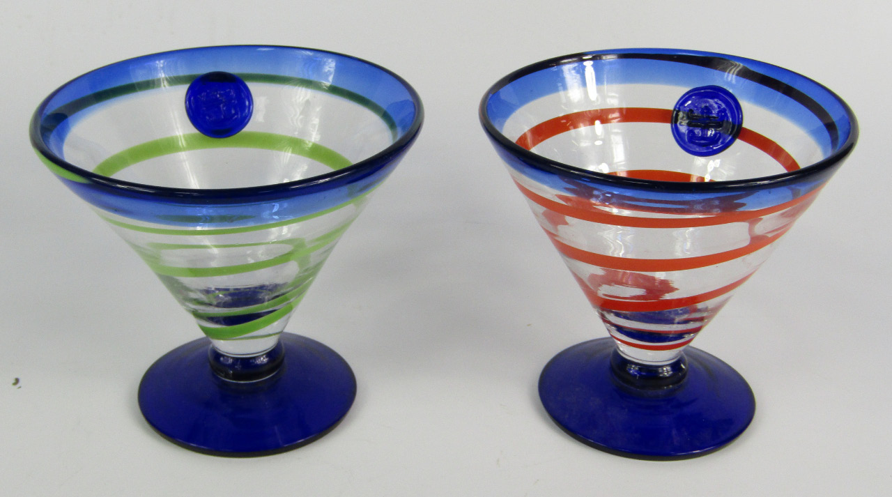 Appraisal: A pair of clear and blue glass sundae dishes decorated