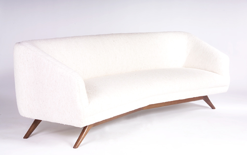 Appraisal: VLADIMIR KAGAN Boomerang wide-angle sofa in walnut with white boucle