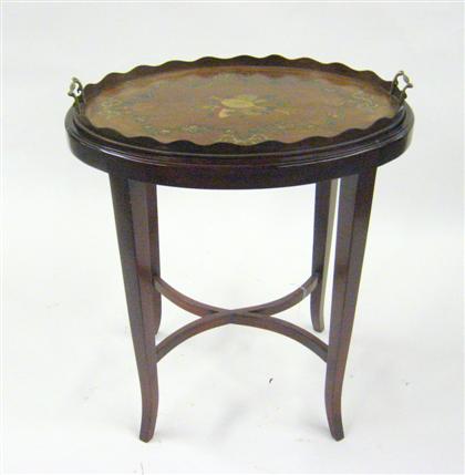 Appraisal: English mahogany painted tray on later stand The oval -handled