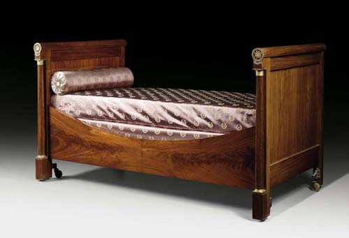 Appraisal: EMPIRE BED Paris circa Flame mahogany With columns at the