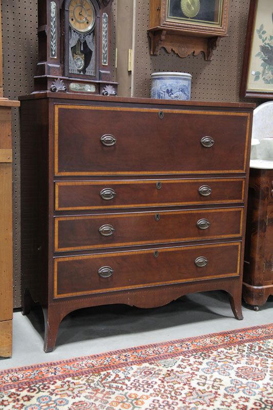 Appraisal: IMPERIAL BUTLER'S CHEST Mahogany having four crossbanded drawers on flared