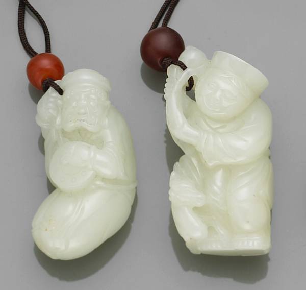 Appraisal: Two white jade figural carvings The first a kneeling bearded