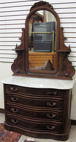 Appraisal: VICTORIAN WALNUT DRESSER WITH TILT MIRROR Rococo Revival design American