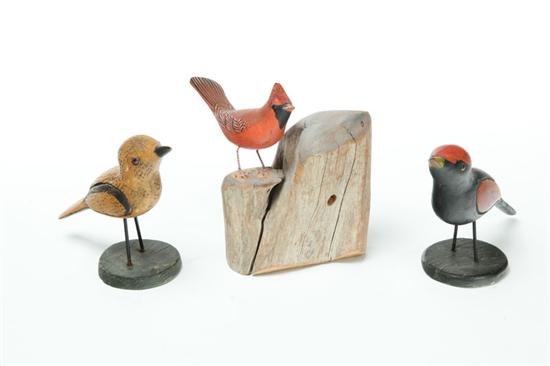 Appraisal: THREE FOLK ART BIRDS American th century wood Carved with