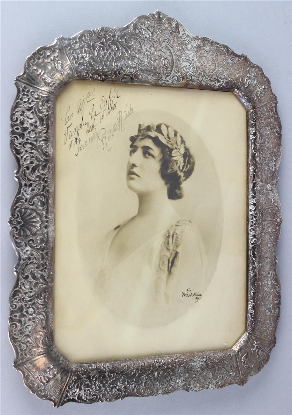 Appraisal: ENGLISH SILVERPLATED PICTURE FRAME WITH AN AUTOGRAPHED IMAGE OF ROSA