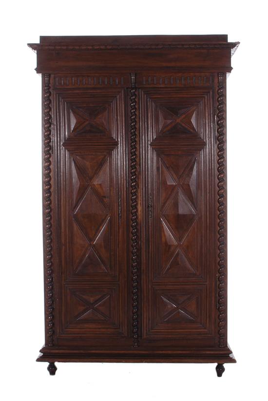 Appraisal: French Provincial walnut armoire last quarter th century molded crown