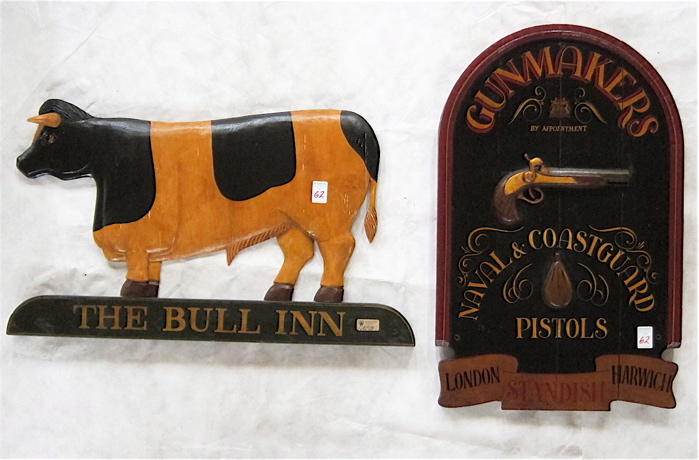 Appraisal: TWO LONDON PAINTED WOOD SIGNS cow figure sign from The