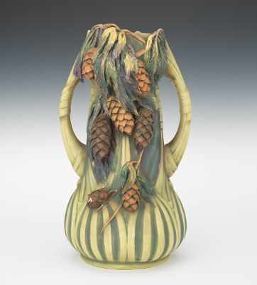 Appraisal: A Large Austrian Pottery Vase Molded in deep relief with