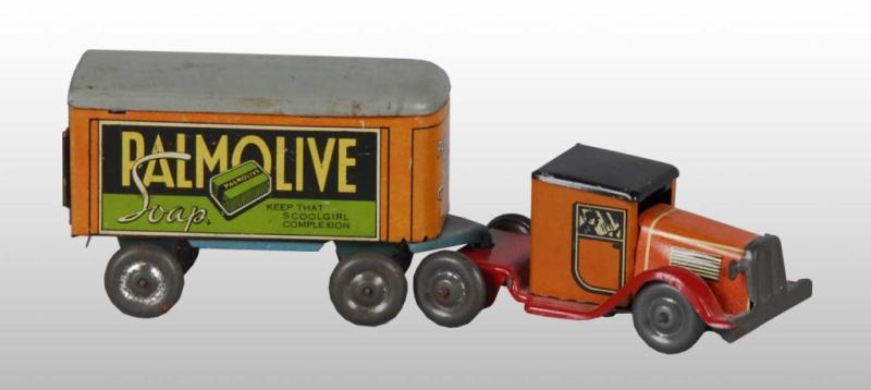 Appraisal: Tin Lindstrom Palmolive Truck Wind-Up Toy Description Working Original back