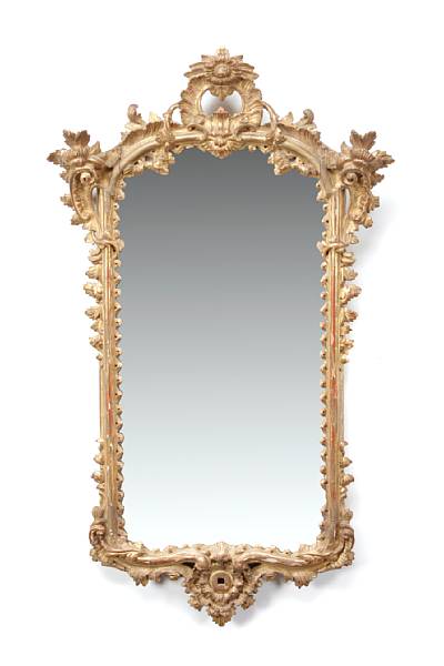 Appraisal: An Italian Rococo style giltwood mirror height in width in