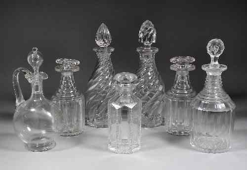 Appraisal: A pair of glass decanters with spiral reeded bodies ins