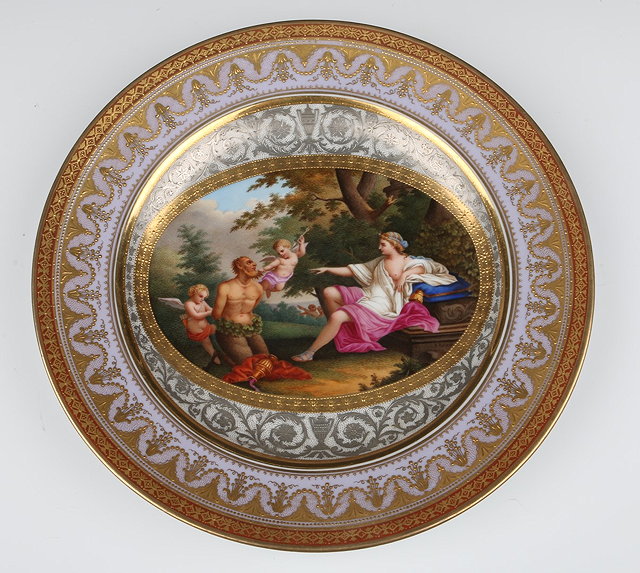 Appraisal: A VIENNA GILDED PORCELAIN CABINET PLATE Diana und der Satyr