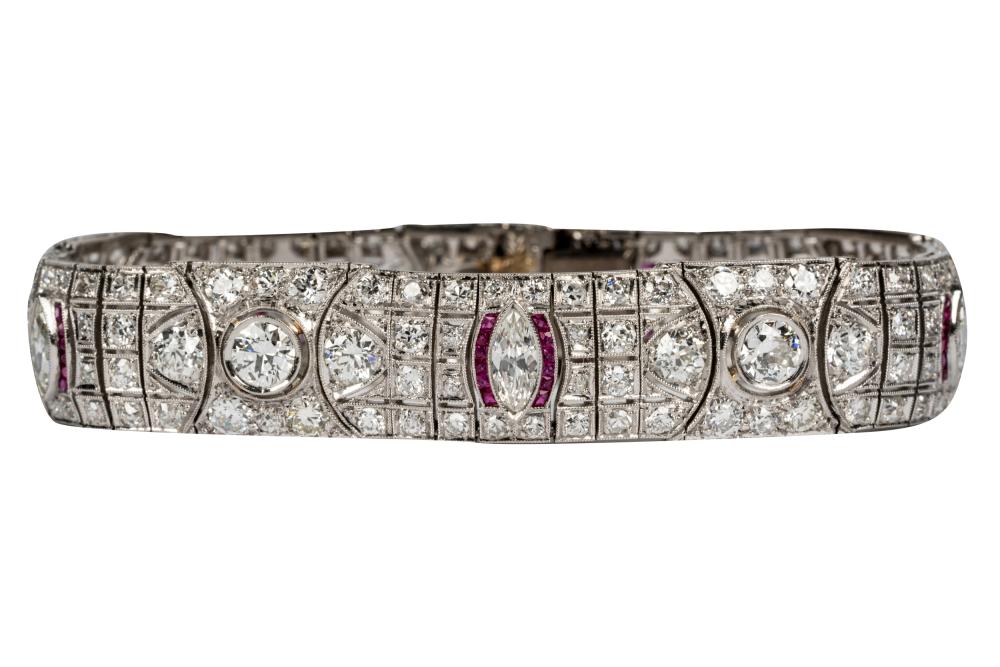 Appraisal: ART DECO PLATINUM DIAMOND RUBY BRACELETcontaining five marquise cut diamonds