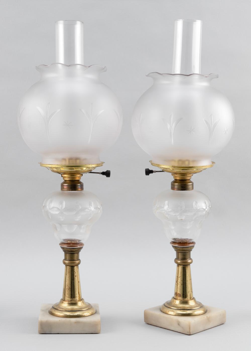 Appraisal: PAIR OF CUT AND FROSTED GLASS FLUID LAMPS SECOND HALF