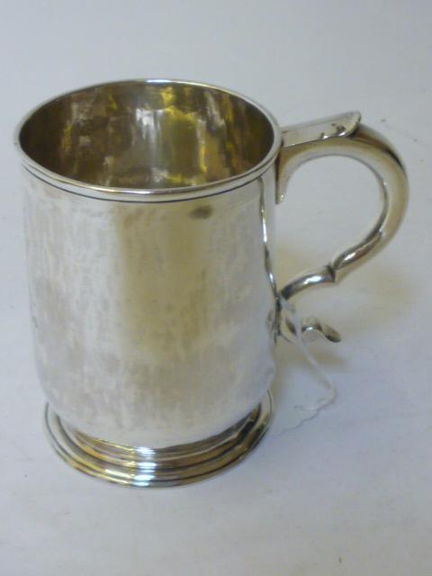 Appraisal: A GEORGE I MUG maker Thomas Mason London of plain