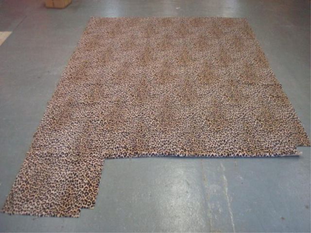 Appraisal: Leopard-patterned broadloom carpet From a Manhattan estate unbound edges but