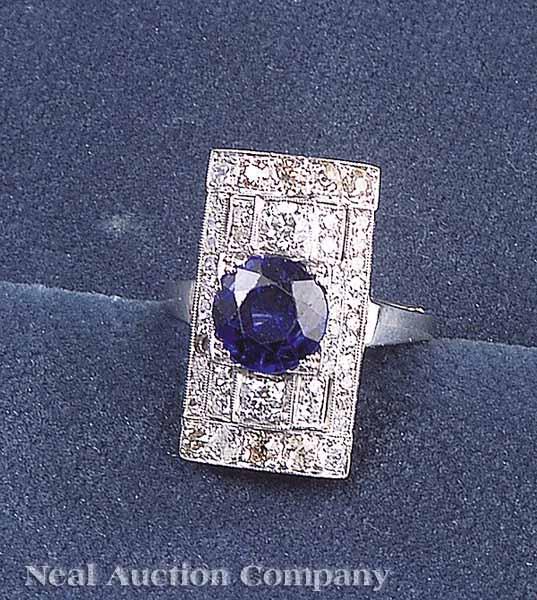 Appraisal: An Art Deco-Style Platinum Diamond and Synthetic Sapphire Dinner Ring