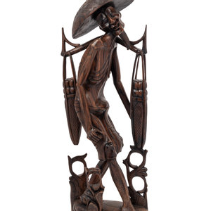 Appraisal: A Carved Wood Figure of a Water Carrier Height inches