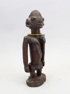 Appraisal: Carved African Figure Beaded Decoration around neck Height in