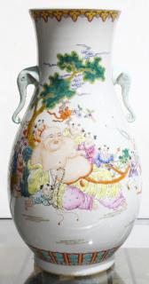 Appraisal: Chinese Porcelain Hu Vase Chinese enameled porcelain hu vase featuring