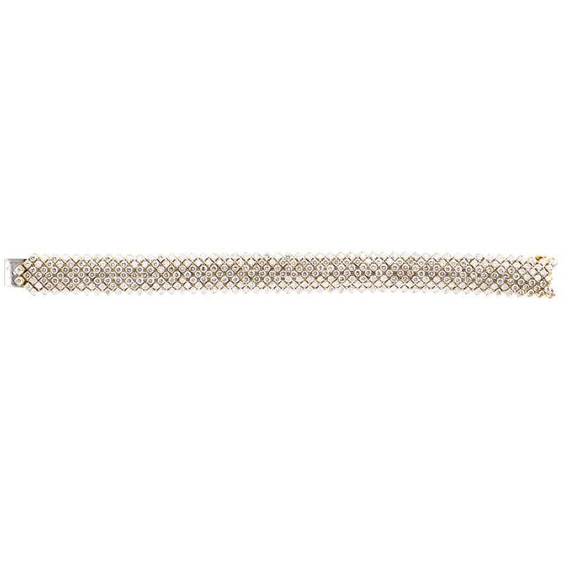 Appraisal: DIAMOND K YELLOW GOLD FLEXIBLE STRAP BRACELET RBC diamonds approx