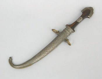 Appraisal: An Antique Arabic Decorated Dagger And Scabbard A Moroccan Jambiya